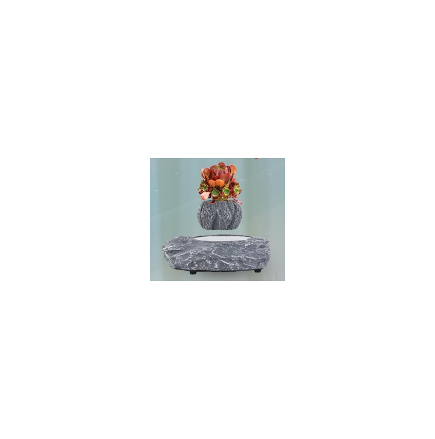 Pot de fleur en lévitation effet marbre avec fleur artificielle