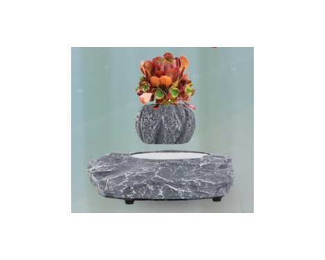 Pot de fleur en lévitation effet marbre avec fleur artificielle